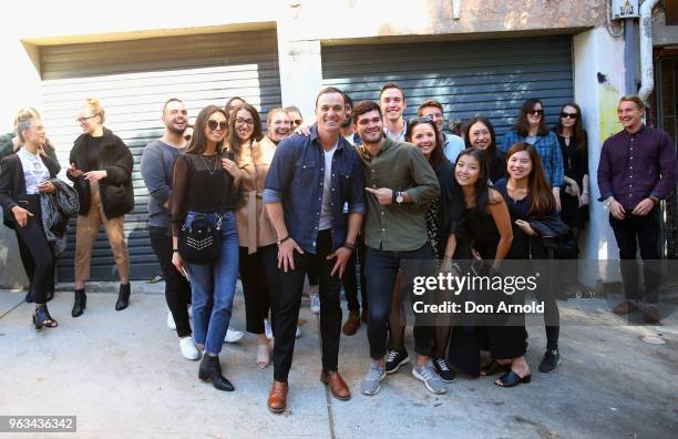 Shannon Noll poses with fans at the launch of Menulog's 25/7 pop up store on May 29, 2018 in Sydney, Australia.