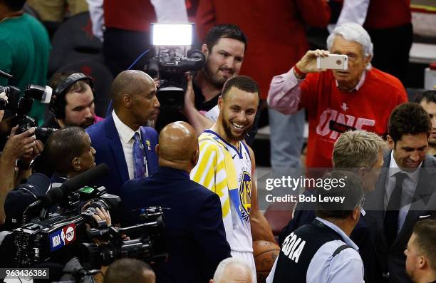 Stephen Curry of the Golden State Warriors celebrates after they defeated the Houston Rockets 101 to 92 in Game Seven of the Western Conference...