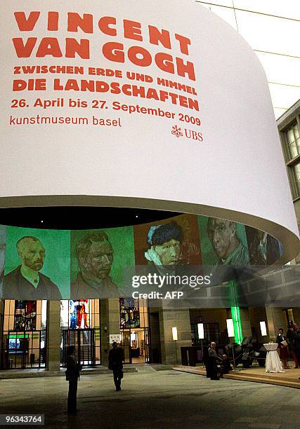 Visitors cross the hall of the Kunstmuseum where is held the exhibition "Vincent van Gogh between Earth and Heaven: The landscapes" on April 23 in...