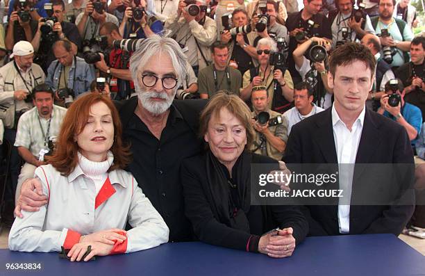 French actress Isabelle Huppert, Austrian director Michael Haneke, French actress Annie Girardot and French actor Benoît Magimel pose during the...