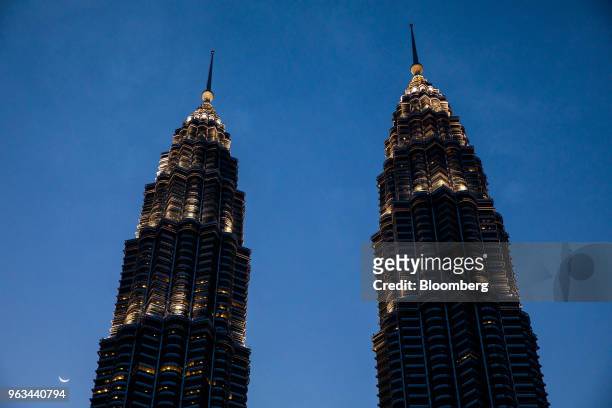 The Petronas Twin Towers, center, stand in Kuala Lumpur, Malaysia, on Friday, May 18, 2018. Malaysian Prime Minister Mahathir Mohamad's government is...