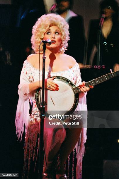 Dolly Parton performs on stage at The Dominion Theatre on March 29th, 1983 in London, United Kingdom.