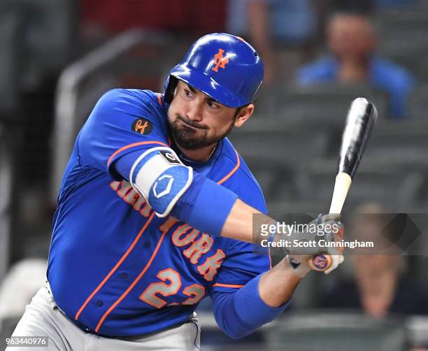 Adrian Gonzalez of the New York Mets knocks in a run with a first-inning single against the Atlanta Braves at SunTrust Field on May 28, 2018 in...