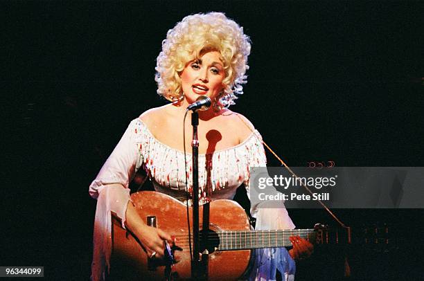 Dolly Parton performs on stage at The Dominion Theatre on March 29th, 1983 in London, United Kingdom.