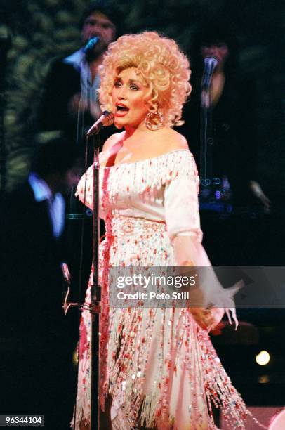 Dolly Parton performs on stage at The Dominion Theatre on March 29th, 1983 in London, United Kingdom.