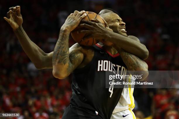 Tucker of the Houston Rockets drives against Draymond Green of the Golden State Warriors in the fourth quarter of Game Seven of the Western...