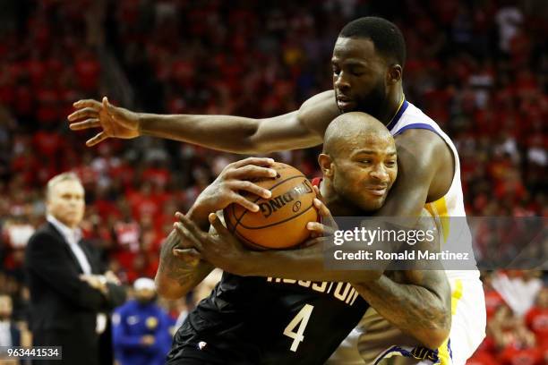 Tucker of the Houston Rockets drives against Draymond Green of the Golden State Warriors in the fourth quarter of Game Seven of the Western...