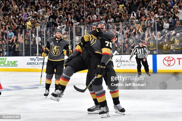 Ryan Reaves celebrates his goal with teammate Pierre-Edouard Bellemare of the Vegas Golden Knights against the Washington Capitals in Game One of the...