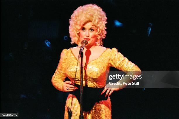 Dolly Parton performs on stage at The Dominion Theatre on March 29th, 1983 in London, United Kingdom.