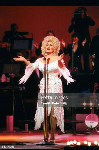 Dolly Parton performs on stage at The Dominion Theatre on March 29th, 1983 in London, United Kingdom.