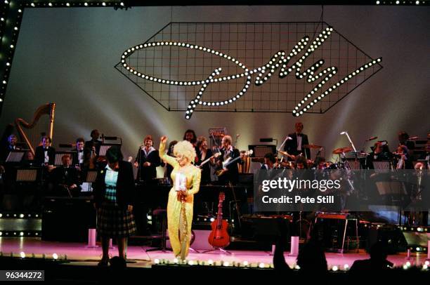 Dolly Parton performs on stage at The Dominion Theatre on March 29th, 1983 in London, United Kingdom.