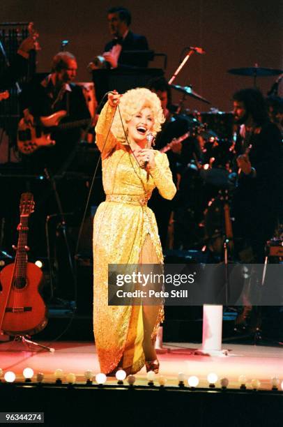 Dolly Parton performs on stage at The Dominion Theatre on March 29th, 1983 in London, United Kingdom.