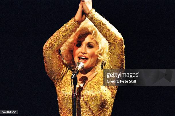 Dolly Parton performs on stage at The Dominion Theatre on March 29th, 1983 in London, United Kingdom.