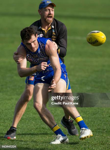 Luke Shuey works on a drill with Adrian Hickmott during a West Coast Eagles AFL training session at Subiaco Oval on May 29, 2018 in Perth, Australia.