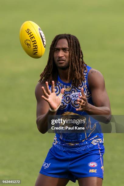 Nic Naitanui receives the ball during a West Coast Eagles AFL training session at Subiaco Oval on May 29, 2018 in Perth, Australia.