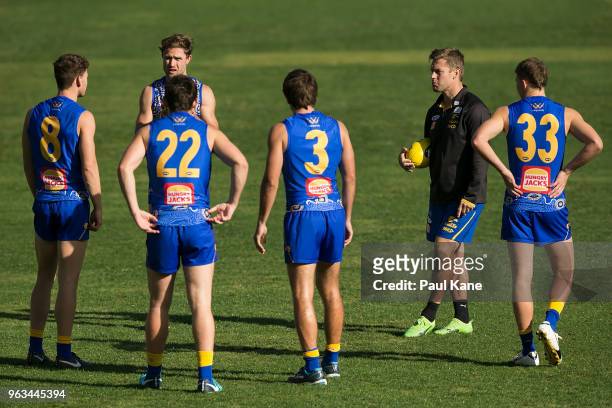 Assistant coach Sam Mitchell talks with players during a West Coast Eagles AFL training session at Subiaco Oval on May 29, 2018 in Perth, Australia.