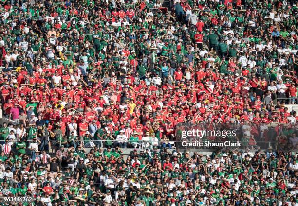 Small group of Wales fans surrounded by Mexican fans during the international friendly match between Mexico and Wales at the Rose Bowl on May 28,...