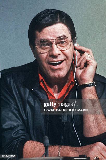 Comedian, director and singer, Jerry Lewis is interviewed on Januray 11, 1984 on TV news in Paris about the film "Retenez-moi ou je fais un malheur"...