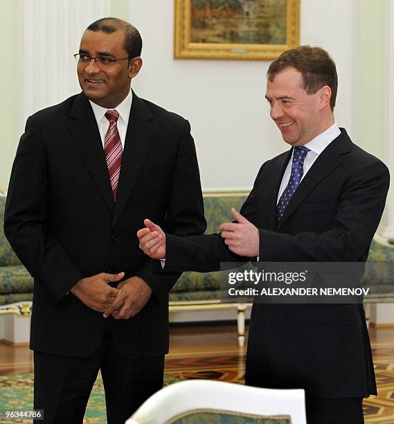 Russian President Dmitry Medvedev gestures after welcoming Guyana President Bharrat Jagdeo in Moscow on February 2, 2010 during their meeting in...