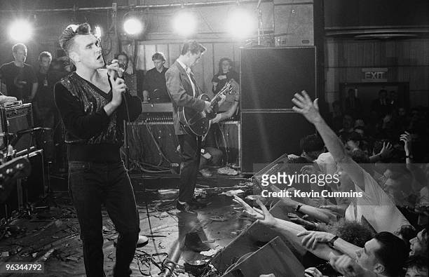 English singer and lyricist Morrissey performing at his first solo concert after the break-up of The Smiths, at Wolverhampton Civic Hall, 22nd...