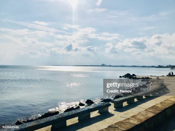 scenic view of sea against blue sky - pomorie stock-fotos und bilder