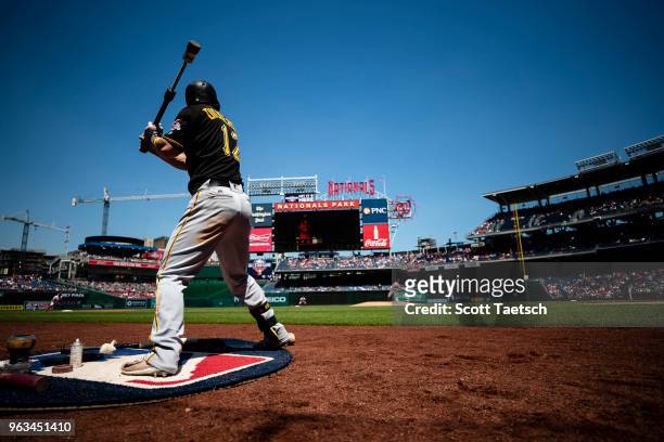 Corey Dickerson of the Pittsburgh Pirates warms-up in the batters circle against the Washington Nationals at Nationals Park on May 3, 2018 in...