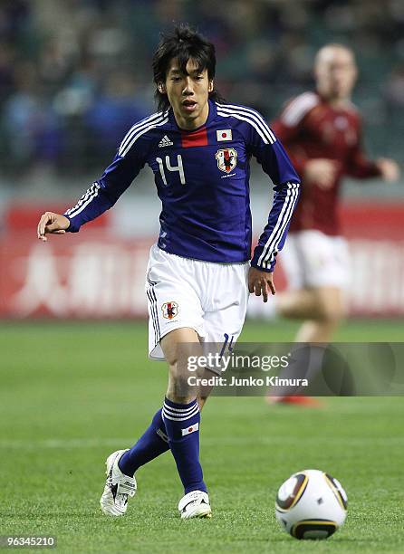 Kengo Nakamura of Japan in action during Kirin Challenge Cup Soccer match between Japan and Venezuela at Kyushu Sekiyu Dome on February 2, 2010 in...