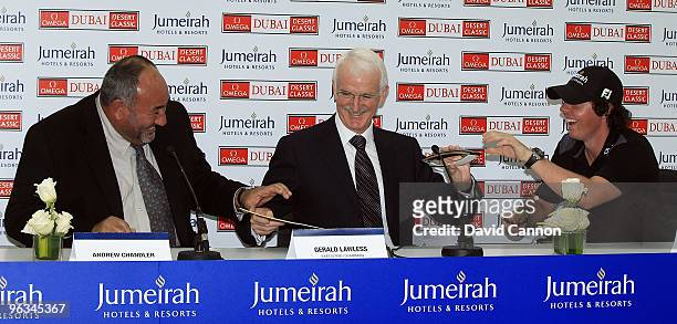 Rory McIlroy of Northern Ireland with his manager Andrew Chandler the Managing Director of ISM and Gerald Lawless the Executive Chairman of Jumeirah...