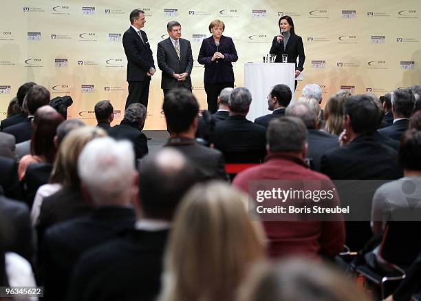 Uwe Froehlich, president of the Federal Association of the German Volksbanken and Raiffeisenbanken, Thomas Bach, president of the German Olympic...