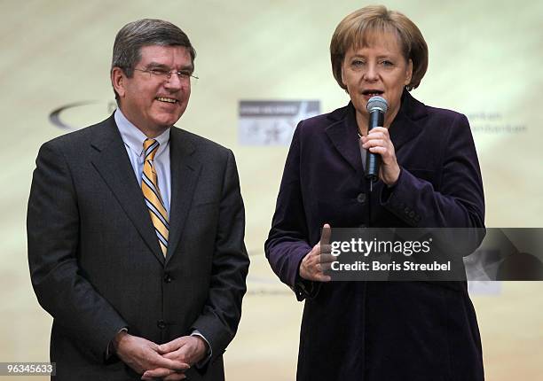 German Chancellor Angela Merkel and Thomas Bach , president of the German Olympic Sports Federation attend the 'Grossen Stern des Sports in Gold...