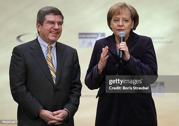 German Chancellor Angela Merkel and Thomas Bach , president of the German Olympic Sports Federation attend the 'Grossen Stern des Sports in Gold...