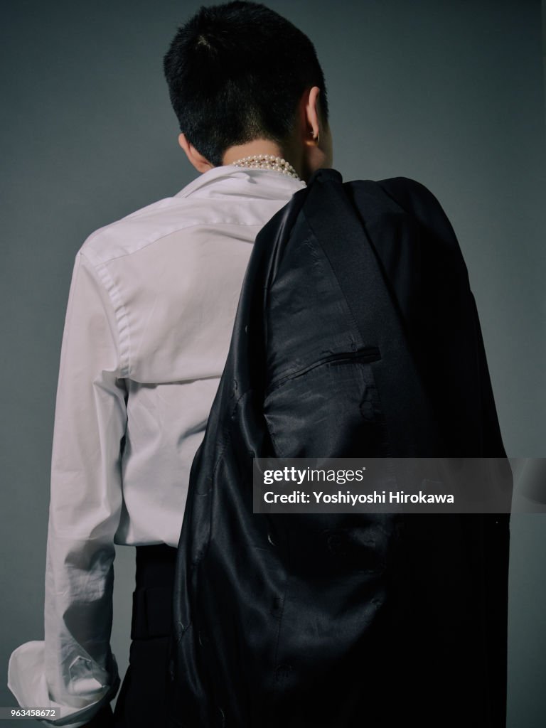 Portrait Japanese woman on mens suits with very short hair