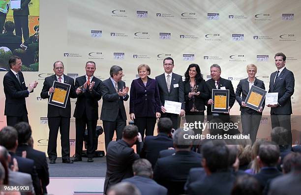 Uwe Froehlich president of the Federal Association of the German Volksbanken and Raiffeisenbanken, second place winner Harald Zeller of TuS 1921...