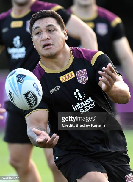 Josh Papalii passes the ball during a Queensland Maroons State of Origin training session on May 29, 2018 in Brisbane, Australia.