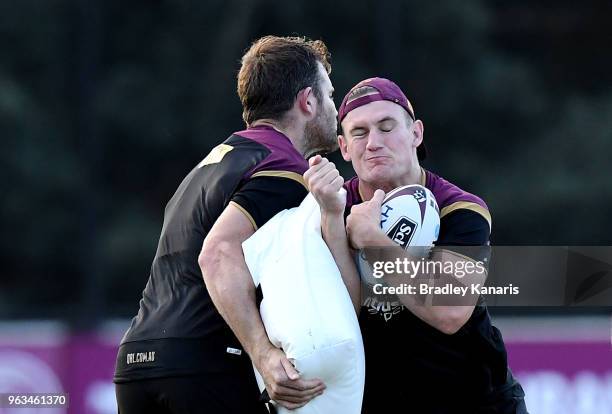 Coen Hess takes on the defence during a Queensland Maroons State of Origin training session on May 29, 2018 in Brisbane, Australia.