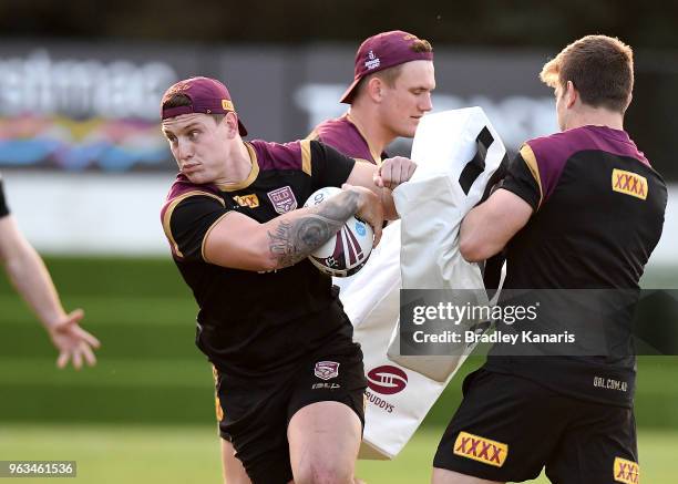 Jarrod Wallace takes on the defence during a Queensland Maroons State of Origin training session on May 29, 2018 in Brisbane, Australia.