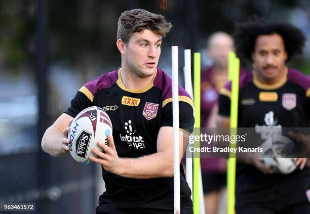 Jai Arrow runs through a training drill during a Queensland Maroons State of Origin training session on May 29, 2018 in Brisbane, Australia.