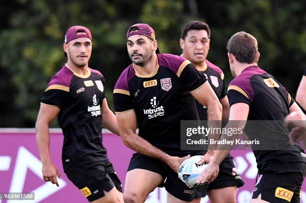 Greg Inglis looks to pass during a Queensland Maroons State of Origin training session on May 29, 2018 in Brisbane, Australia.