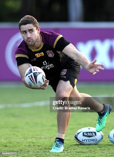 Andrew McCullough passes the ball during a Queensland Maroons State of Origin training session on May 29, 2018 in Brisbane, Australia.