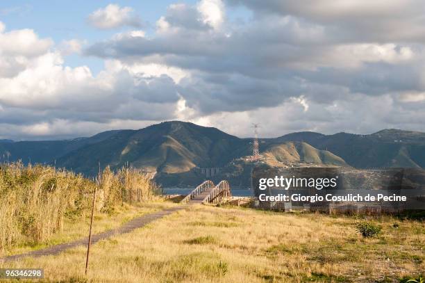 Calabria in the background as seen from the nearest point along the Sicilian coast, in Ganzirri, a small fishing village on the Strait of Messina, in...