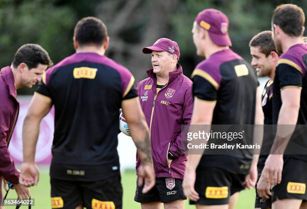 Coach Kevin Walters talks to his players during a Queensland Maroons State of Origin training session on May 29, 2018 in Brisbane, Australia.