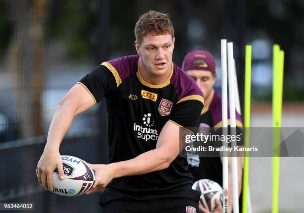 Dylan Napa looks to pass during a Queensland Maroons State of Origin training session on May 29, 2018 in Brisbane, Australia.