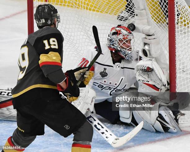 Reilly Smith of the Vegas Golden Knights scores a second-period goal against Braden Holtby of the Washington Capitals during Game One of the 2018 NHL...