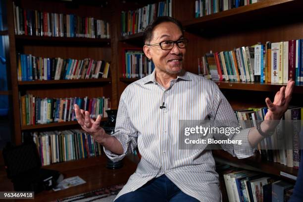 Anwar Ibrahim, founder of the People's Justice Party, speaks during a Bloomberg Television interview in Kuala Lumpur, Malaysia, on Friday, May 18,...