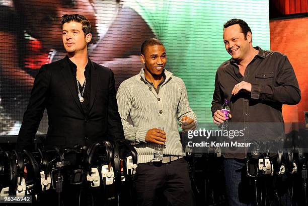 Singers Robin Thicke and actor Vince Vaughn perform at the "We Are The World 25 Years for Haiti" recording session held at Jim Henson Studios on...