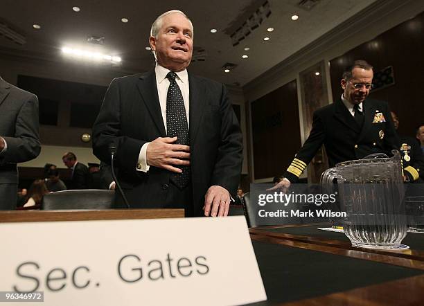 Defense Secretary Robert Gates and Chairman of the Joint Chiefs of Staff Adm. Michael Mullen arrives at a Senate Armed Services Committee hearing on...