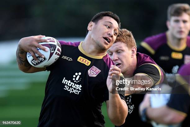 Josh Papalii attempts to break away from the defence during a Queensland Maroons State of Origin training session on May 29, 2018 in Brisbane,...