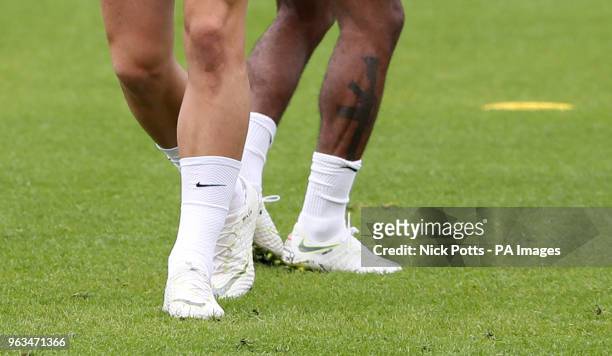 Previously unreleased photo dated of England's Raheem Sterling visibly showing a tattoo on his leg during a training session at St George's Park,...