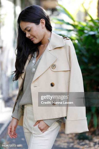 Alex Teo wearing Khaite pants and jacket, Shaina Mote sweater and Isabel Marant sandals on May 29, 2018 in Sydney, Australia.