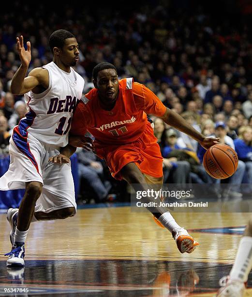 Scoop Jardine of the Syracuse Orange drives against Jeremiah Kelly of the DePaul Blue Demons at the Allstate Arena on January 30, 2010 in Rosemont,...